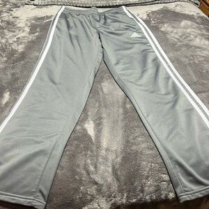 Adidas track pants. Drawstring. Side pockets. 14/16. Never worn.